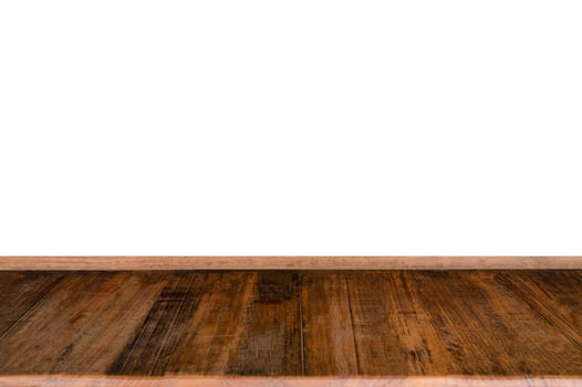 Hardwood rough plank table top on background photo