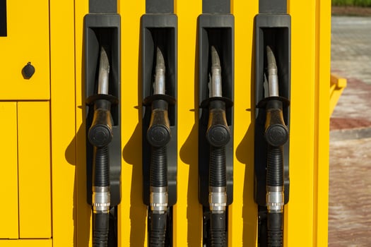 Fuel pumps station close up. Petrol pump filling nozzles at gas station photo