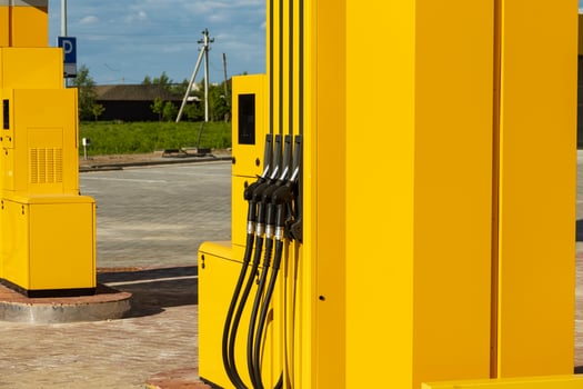 Gas station or a car filling station. Diesel and petrol fuel pistols at a gas station photo