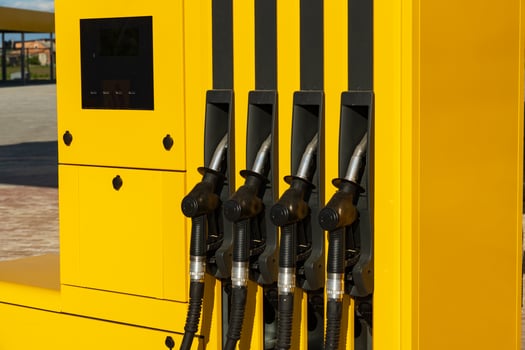 Gas station. Fuel pumps station close up. Petrol pump filling nozzles at gas station photo