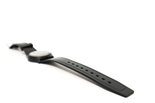 A Sleek Black Wristwatch on a Clean White Surface Showcasing Minimalist Design photo
