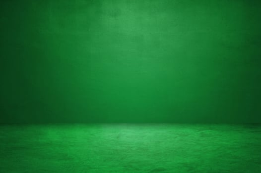 Green concrete room with spotlight background, perfect for a backdrop. photo