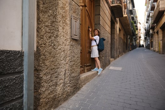 Exploring a Historic Alley with a Unique Wooden Door photo