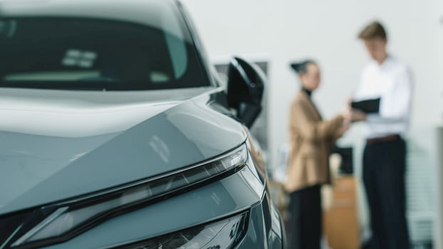 Closing the deal. Handing over the keys. The concept of the final stage of a flawless purchase, sale or test drive of a car, emphasizing the customer's satisfaction. photo