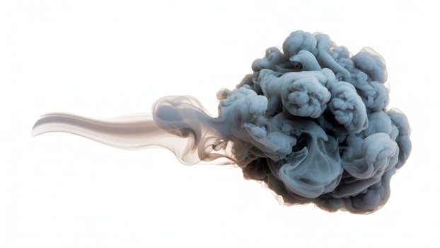 A cloud of gray smoke or pigment spreading out in water against a white background photo