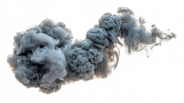 A swirling cloud of gray smoke against a bright white background with soft lighting photo