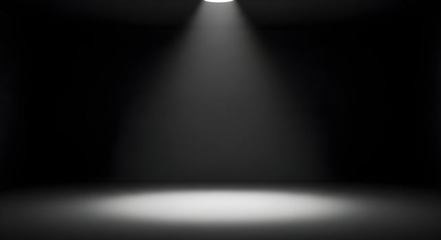 Dark Minimalist Studio with Single Overhead Spotlight photo