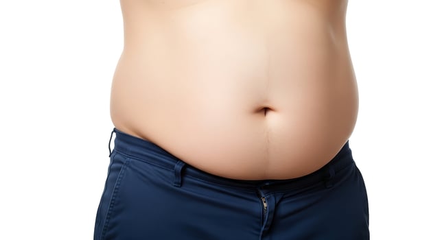 A man's stomach with a large belly photo