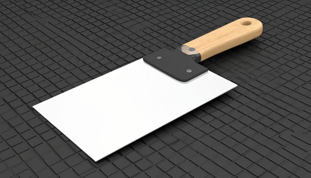 White Paint Scraper Blade On Rubber Mat Black photo
