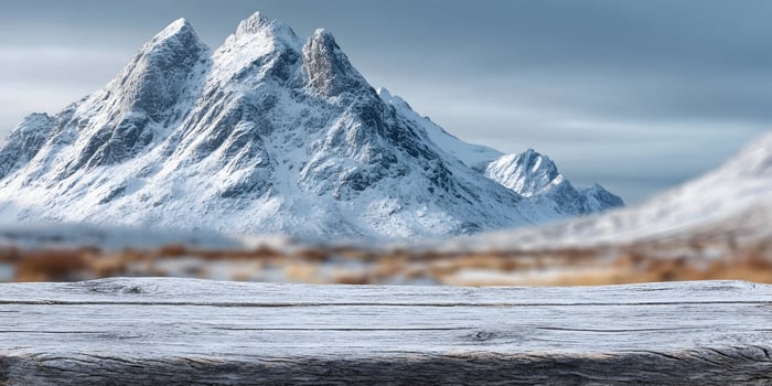 Snow Covered Mountains Winter Landscape Wooden Tabletop Scene photo