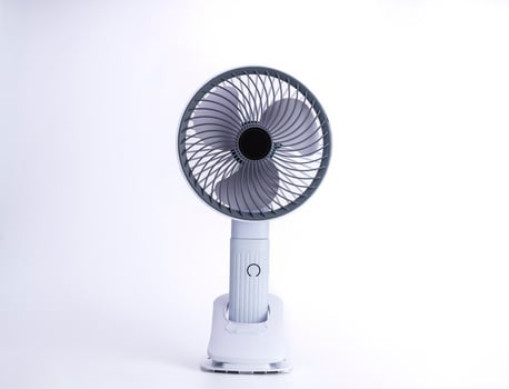 Electric fan powered by usb battery. Product design by modern technology. Isolated on white background. photo