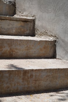 Cement stairs exposed to sunlight during the day photo