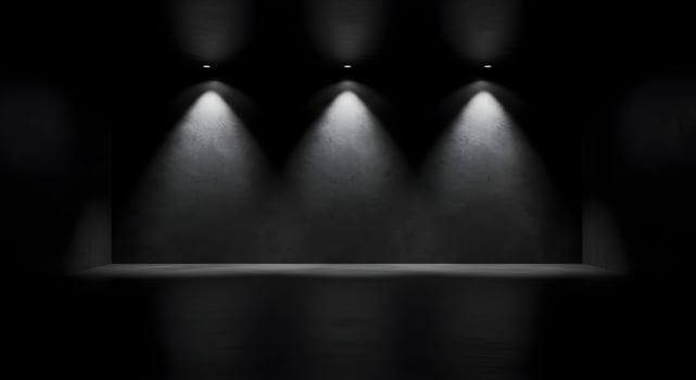 Minimalist Empty Room with Ceiling Spotlights and Textured Concrete Walls photo