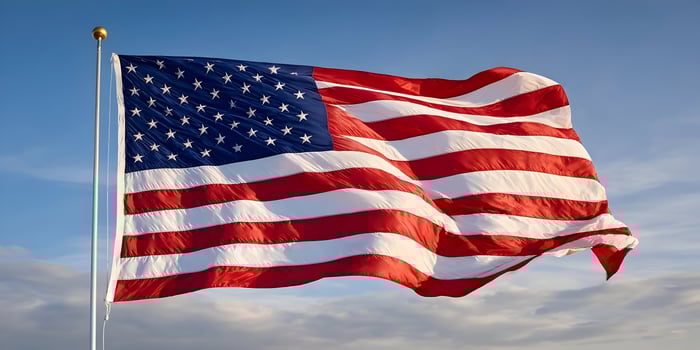 American Flag Waving Blue SkyP atriotic Stars Stripes National Symbol USA photo