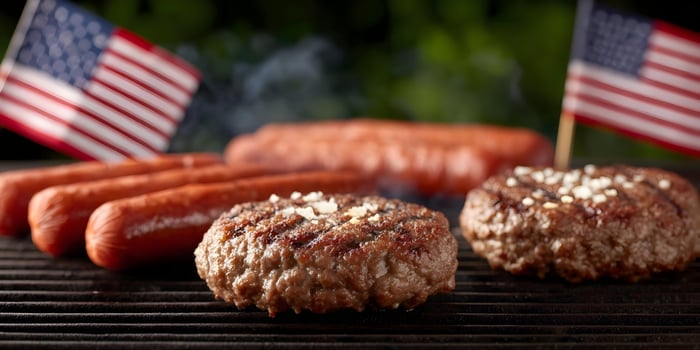Grilling Burgers Hot Dogs Fourth Of July American Flags photo