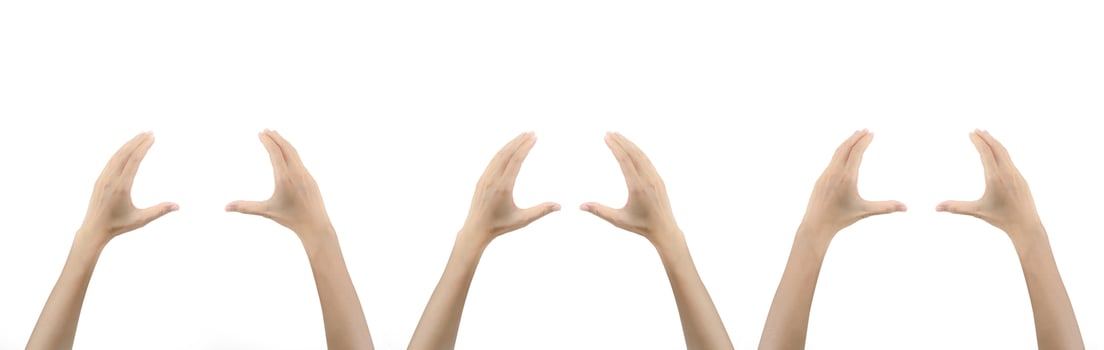 Hands showing coordinated gestures isolated on white background demonstrating unity and teamwork concept for business collaboration and partnership presentations in corporate environments. photo