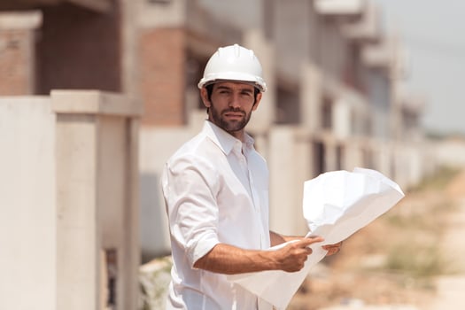 Portrait of engineers inspect and assess the residential home construction site's progress,70 photo
