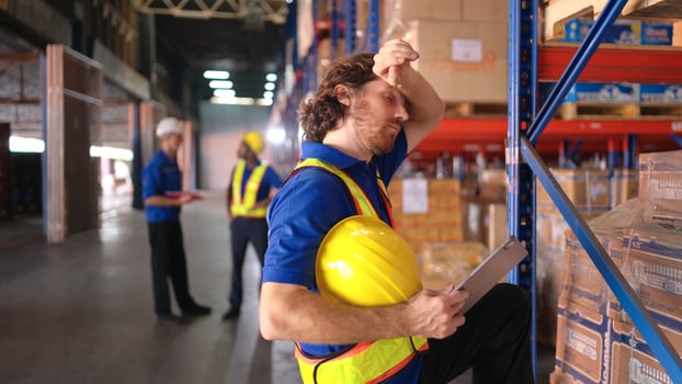 Portrait of warehouse workers are reviewing the list of items based on the documentation,38 photo