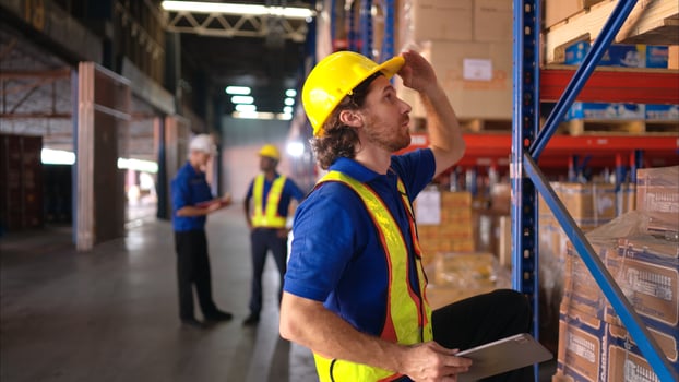 Portrait of warehouse workers are reviewing the list of items based on the documentation,20 photo