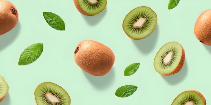 Kiwi Fruit Pattern Green Background Whole Halves Mint Leaves photo