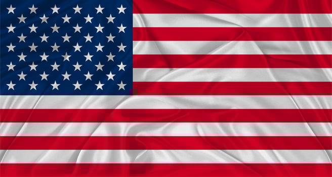 Flag of USA with cloth texture. Close up of American flag waving photo