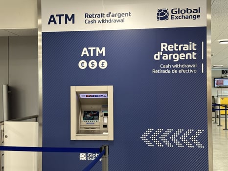 Nice, France - May 10, 2025 ATM machine at Global Exchange location, featuring cash withdrawal services and multilingual signage, providing convenience for travelers in busy airport environment photo