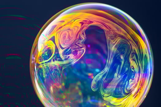 Swirling Colors Inside a Soap Bubble Against a Dark Blue Background photo