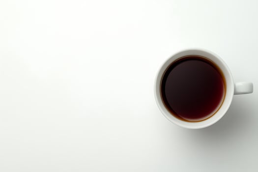 Freshly Brewed Tea in Cup on Table. photo