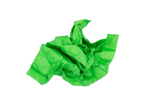 Green crumpled paper isolated on white photo