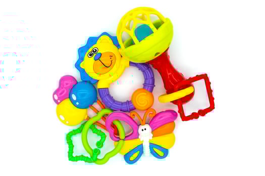 Colorful baby toys on white. Toys for newborns. Kids toys. Top view photo