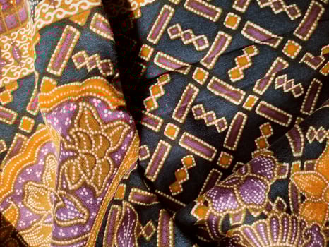a close up of a colorful patterned fabric photo