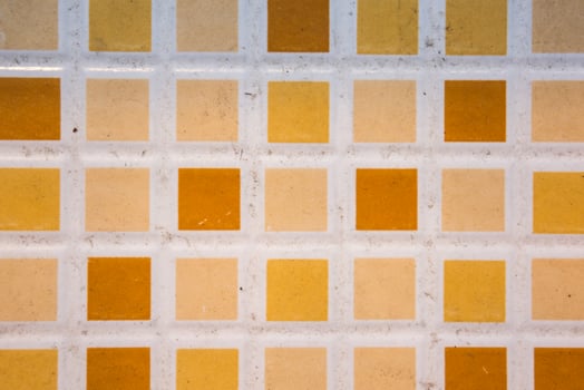 tiled floor pattern background, small square colorful tiles on the bathroom wall. photo