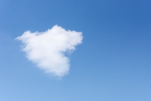 The cloud in shape of heart against blue sky, To the Valentine's Day. photo