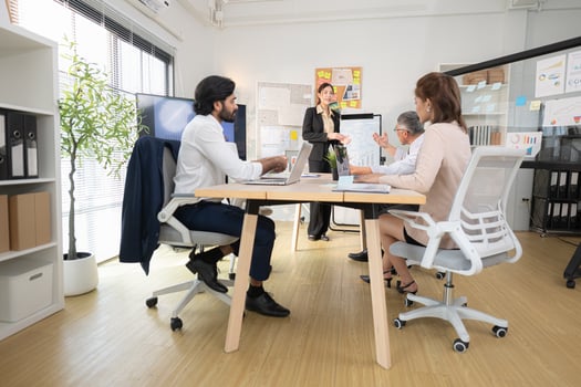 In a contemporary office, a group of senior executives with a mission to approve new projects,163 photo