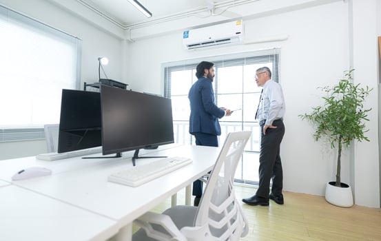 In a contemporary office, two senior executives with a mission to brainstorm and monitor,94 photo