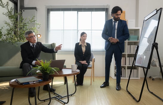 In a contemporary office, a group of senior executives with a mission to approve new projects,40 photo