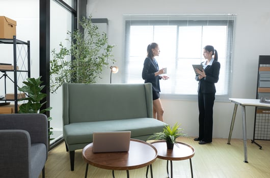 In a contemporary office, two young woman entrepreneurs are on a mission to generate ideas,31 photo