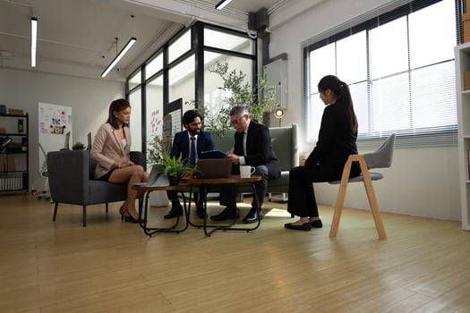 In a contemporary office, a group of senior executives with a mission to approve new projects,4 photo