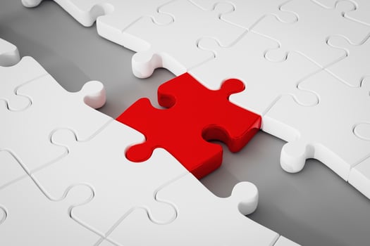 Red puzzle connecting the white puzzle. Concept of Solution, and perfect completion of pieces. photo