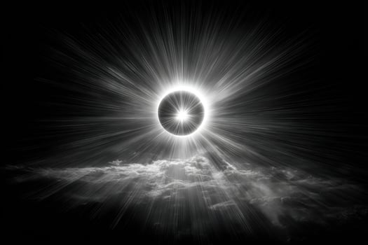 A black and white photo of a sunburst