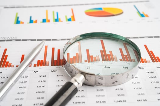 Magnifying glass spreadsheet graph photo
