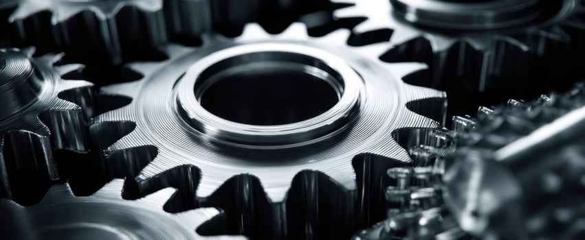 The intricate design of metal gears in a mechanical assembly photo