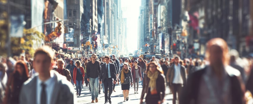 The bustling city street filled with professionals and tourists during the daytime. photo