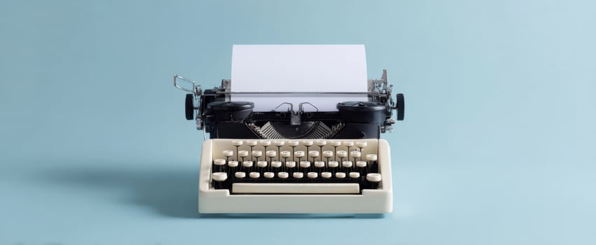 The vintage typewriter on a minimalist background inviting creativity and inspiration. photo