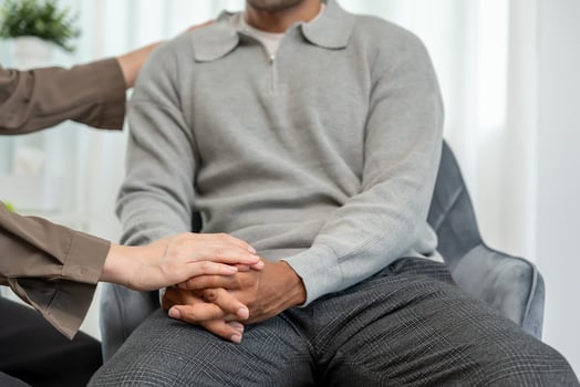 psychiatrist hold hand support each while discussing family issues. doctor encourages and empathy man suffers depression. psychological, save divorce, Hand in hand together, trust photo