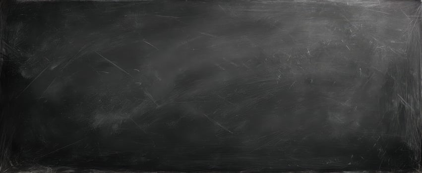 The blackboard with a textured surface inviting creative ideas and lessons. photo