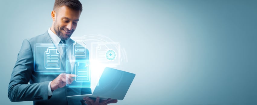 The businessman using a laptop with digital data interface for success. photo