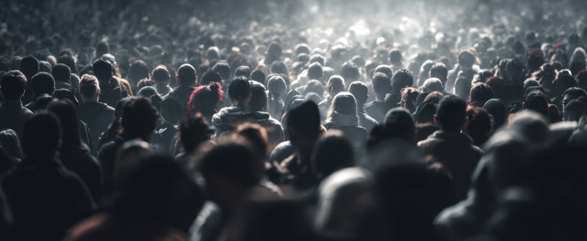 The vibrant crowd of diverse people in a lively urban setting. photo