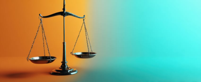 The Balanced Scales of Justice Against a Split Color Background photo