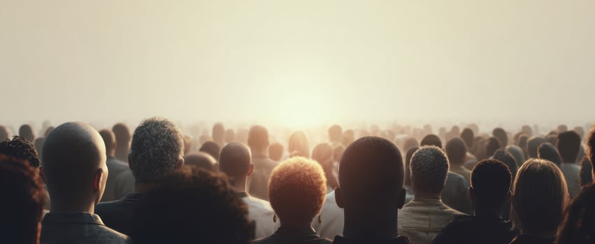 The crowd witnessing a breathtaking sunset in a serene gathering scene. photo